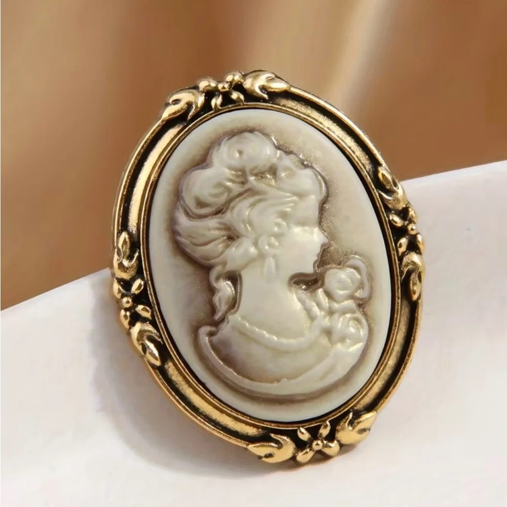 New vintage-style looking cameo brooch resin portrait gold-toned metal frame